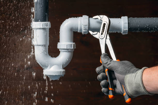 Professional Emergency Plumber technician working in Elco, PA